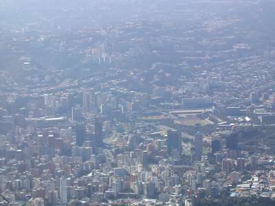 View of Caracas. In the center at the right, the stadiums of the ciudad universitaria (campus)
